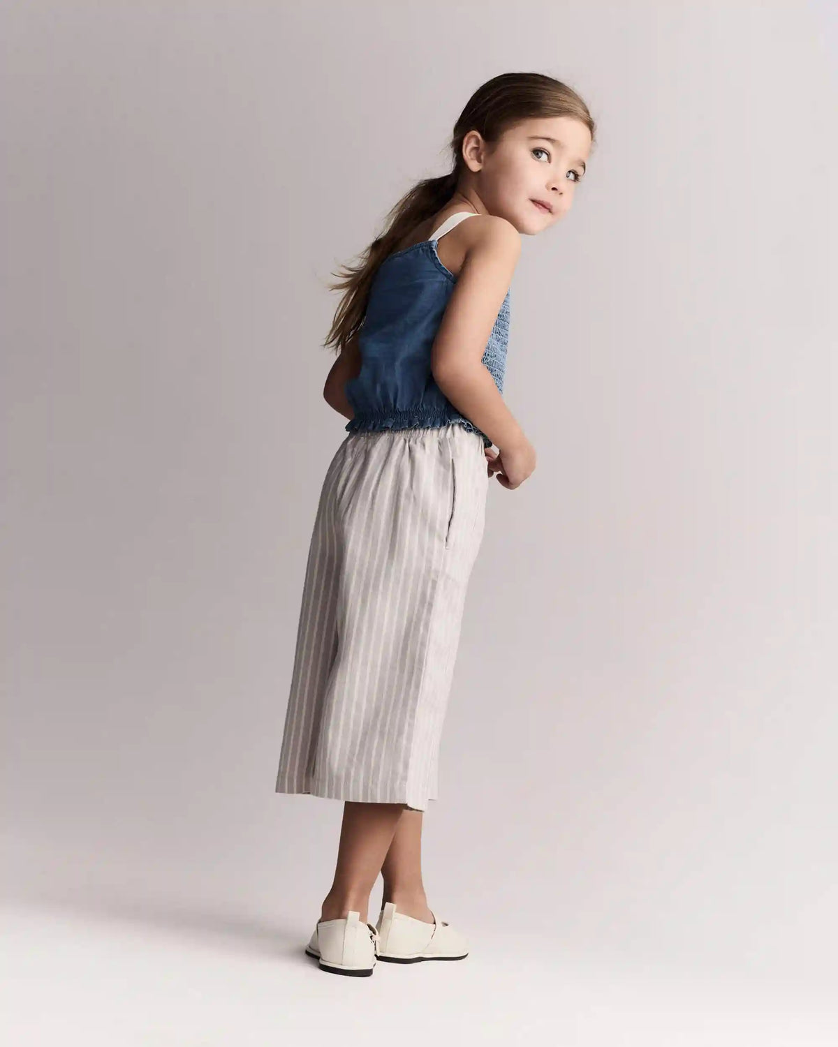 Toddler Girl Smocked Peplum Top in Chambray