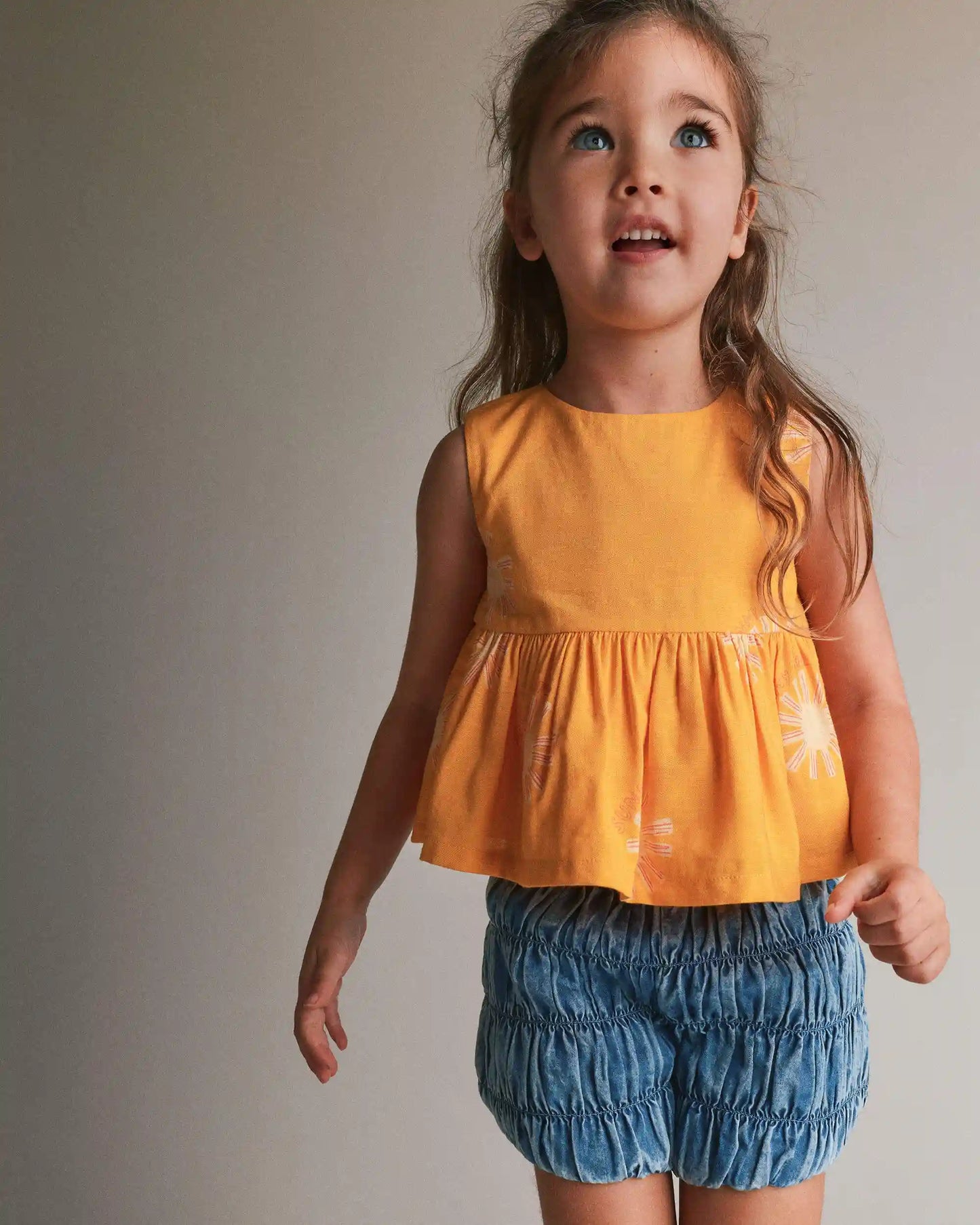 Toddler Girl Peplum Top in Sunny Life Print - Golden Yellow