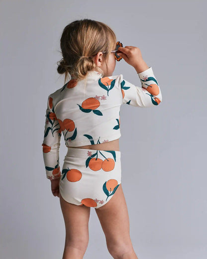 Toddler Girl Half-Zip Long-Sleeve Rashguard Set in Clementine Grove Print - Cream