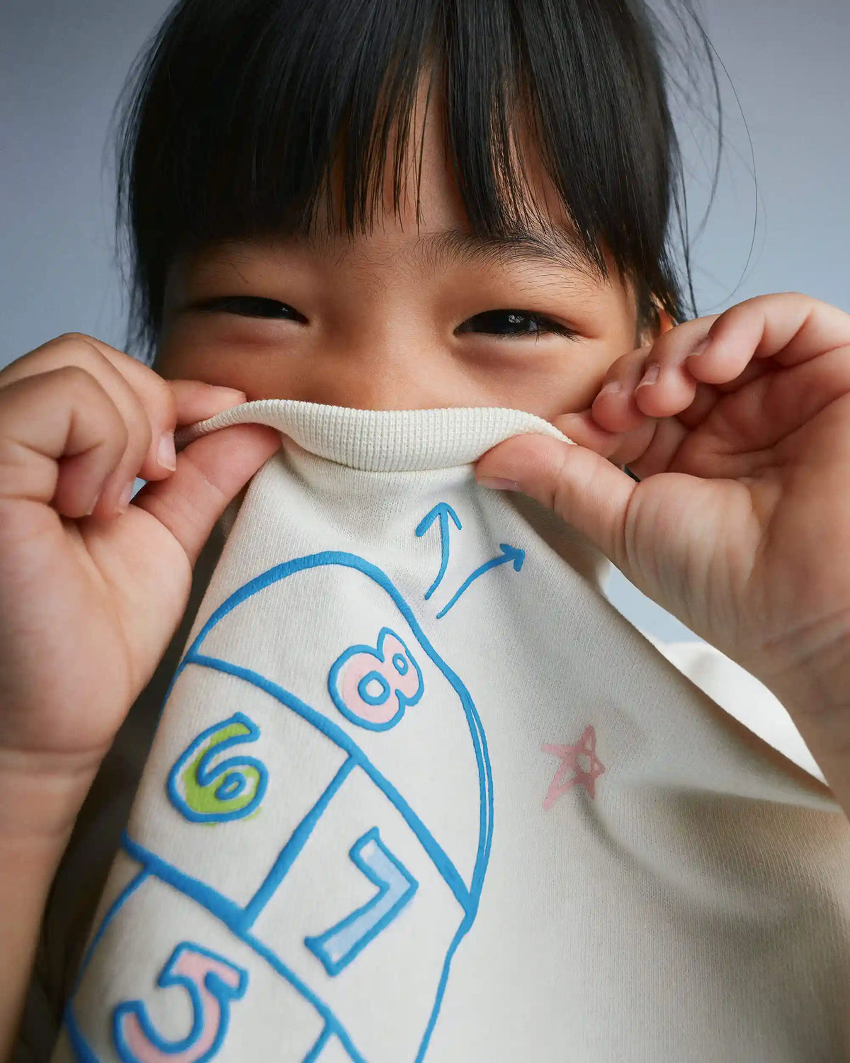 Toddler Girl 'Field Day' Breezy Top in Hopscotch Print - Cream